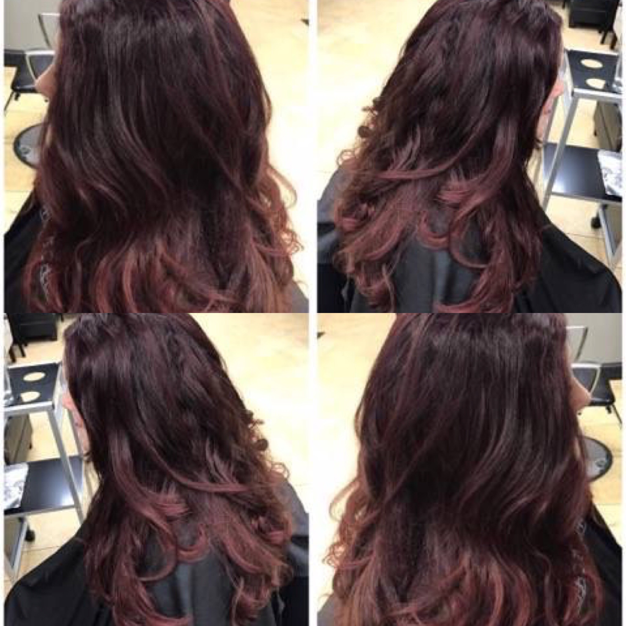 A red toned burgundy long haircut done by Beth