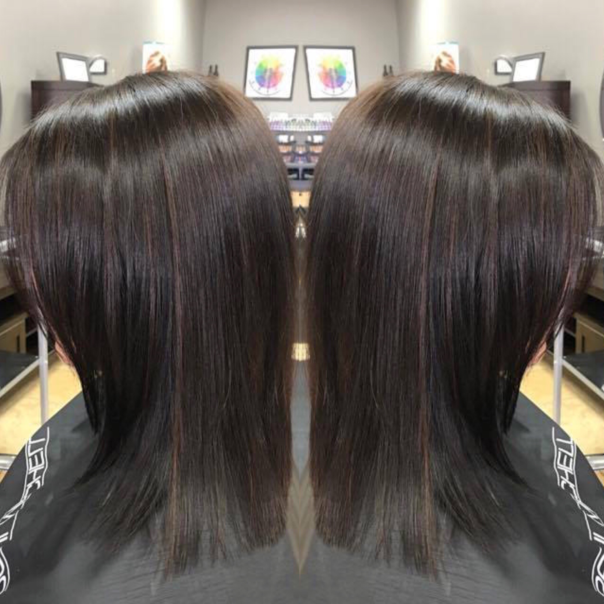 A cool toned dark brunette haircut and color done by Megan